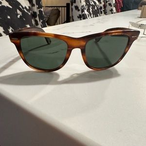 Rayban Tortoise Wayfarer 11 sunglasses. Well loved.